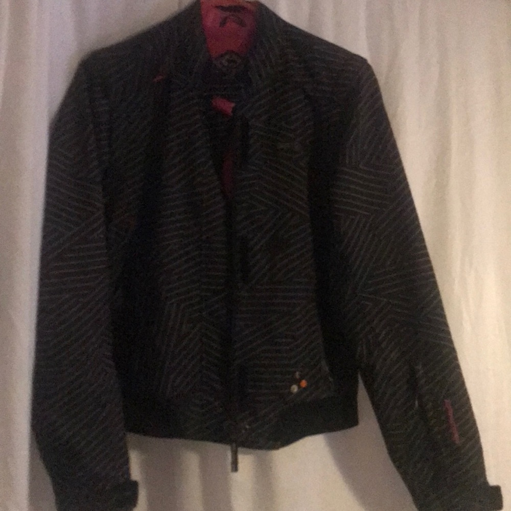 Motorcycle jacket. Black white striped pink inside
